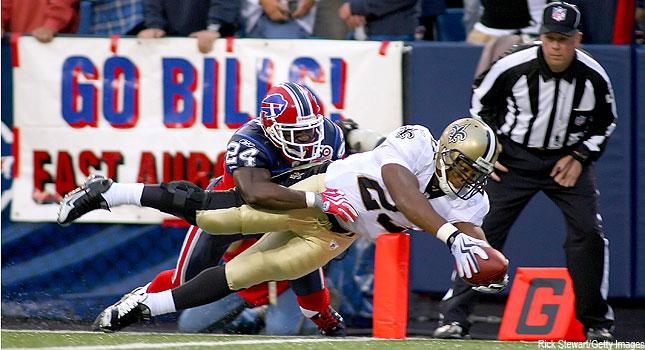 Lynell Hamilton of the New Orleans Saints tackles Roscoe Parrish