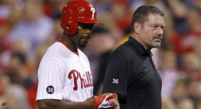 Rollins not concerned with leg in Phils' win