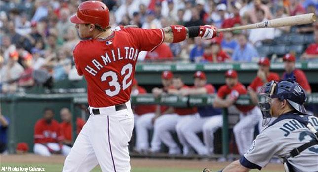 Texas Rangers' Josh Hamilton loses his bat during the sixth inning of Game  5 of baseball's