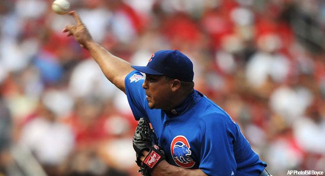 Chicago Cubs manager Lou Piniella walks the dugout during the