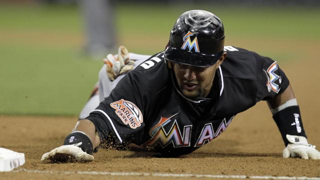 Ozzie Guillen and Carlos Zambrano, together with the Marlins