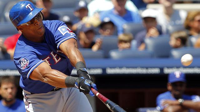 Texas Rangers' Adrian Beltre follows through on a double to right