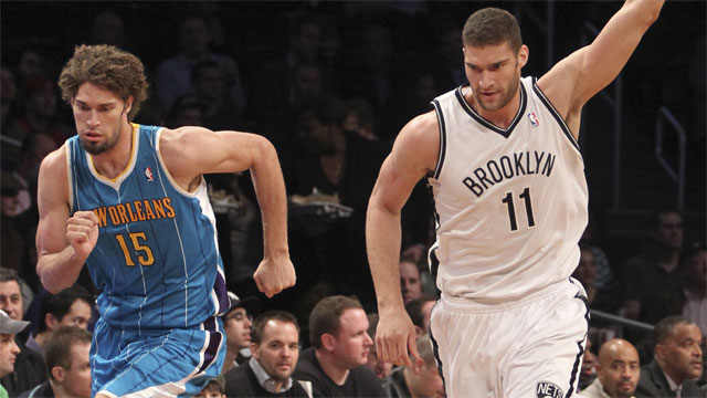 New Jersey Nets Brook Lopez (11) slam dunks over Washington