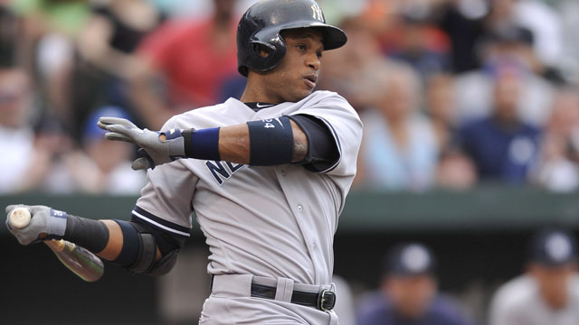 New York Yankees Robinson Cano hits an RBI single in the sixth