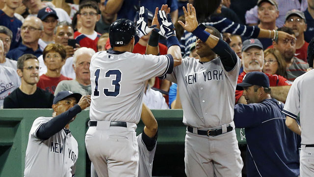 Photo: New York Yankees Alex Rodriguez and Robinson Cano react at