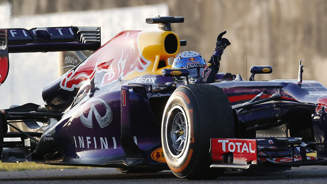 Red Bull driver Sebastian Vettel of Germany celebrates on his car