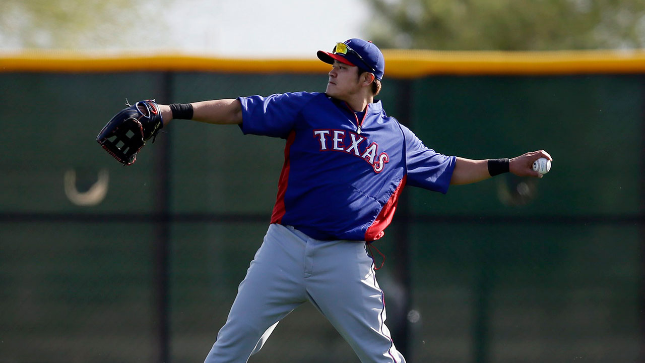 Texas Rangers' Shin-Soo Choo hits a sacrifice fly to score Rougned Odor in  the seventh inning of a baseball game against the Detroit Tigers in  Detroit, Thursday, June 27, 2019. (AP Photo/Paul