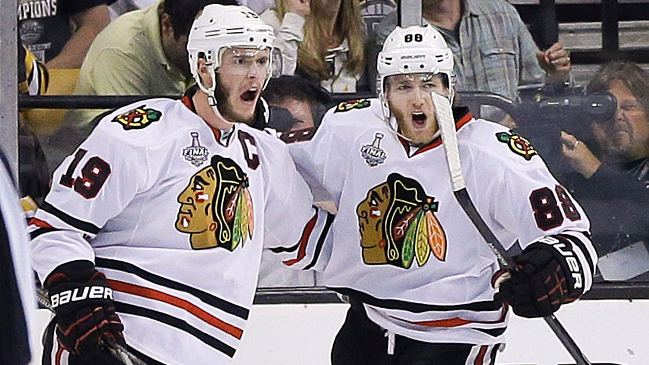 Jonathan-Toews-(L)-and-Patrick-Kane.-(Elise-Amendola/AP).