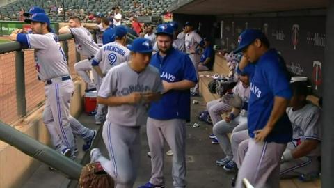 Kawasaki and Bautista have some fun in dugout 