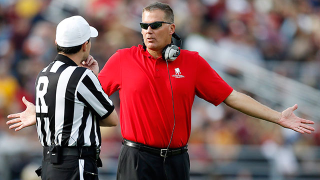 Referee Brad Allen (122) in a 'Crucial Catch' hat during an NFL