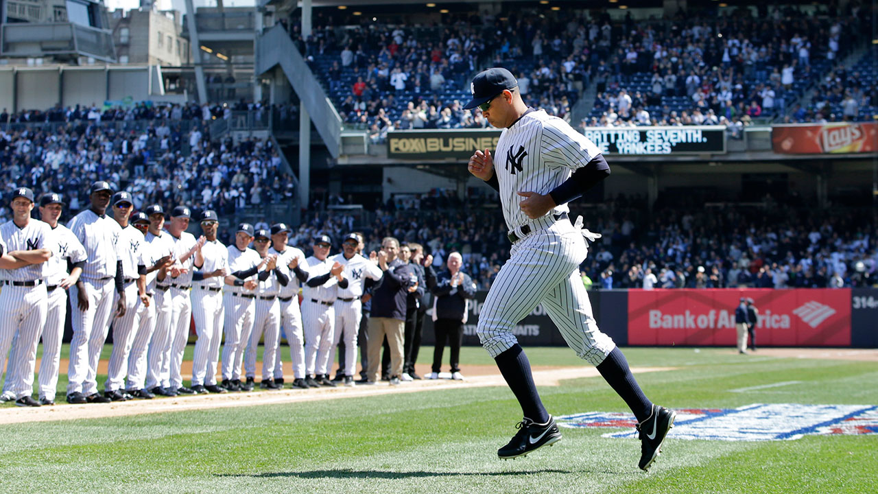 New York Yankees Alex Rodriguez walks through the dugout to the