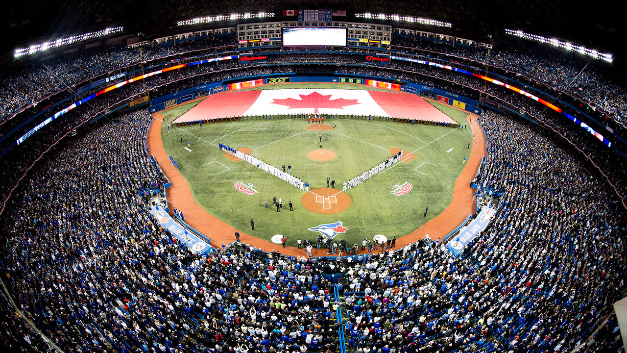 Fans have there bags checked before walking through metal detecters upon  entering the stadium at the opening series of the 2015 MLB Season where the  New York Yankees will play the Toronto