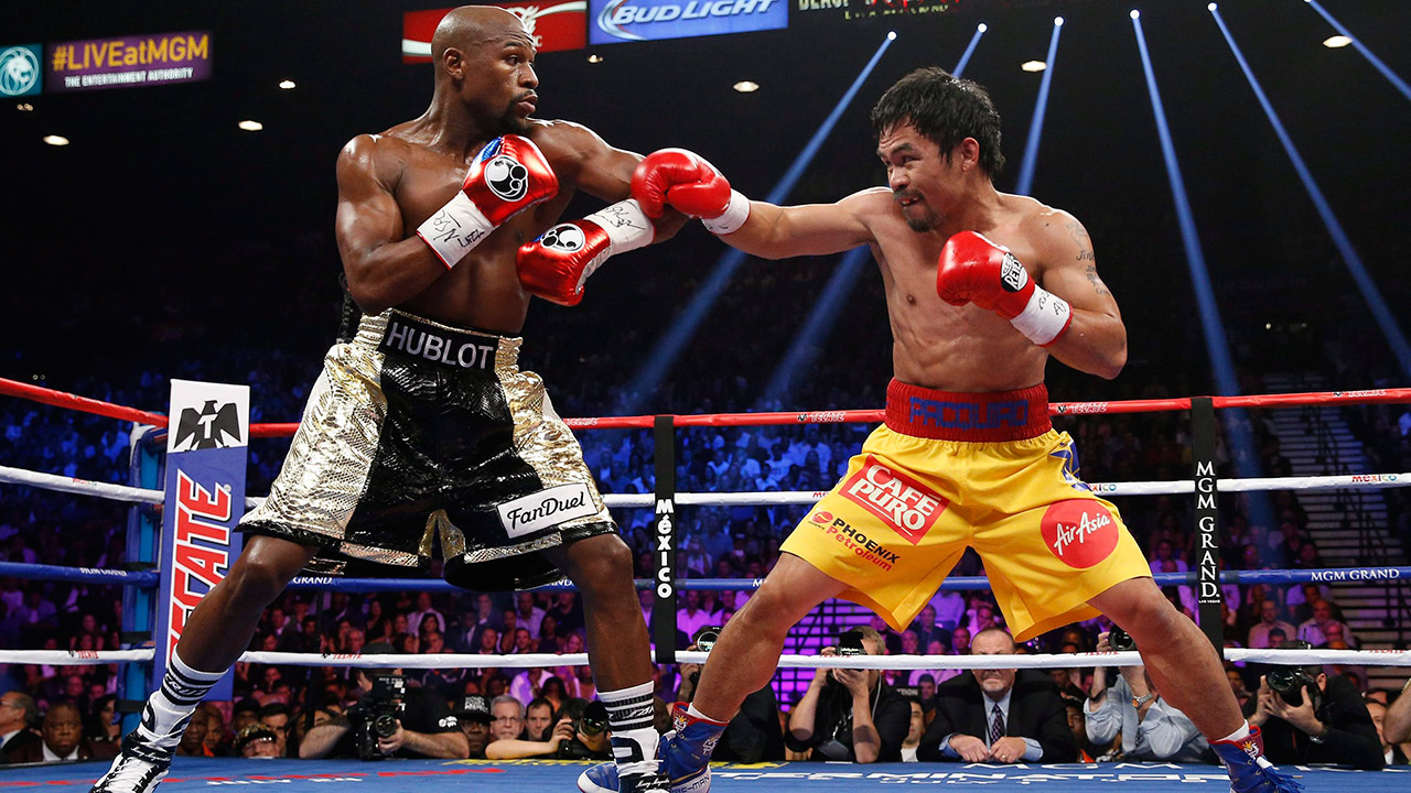 Manny Pacquiao challenges Floyd Mayweather for a rematch
