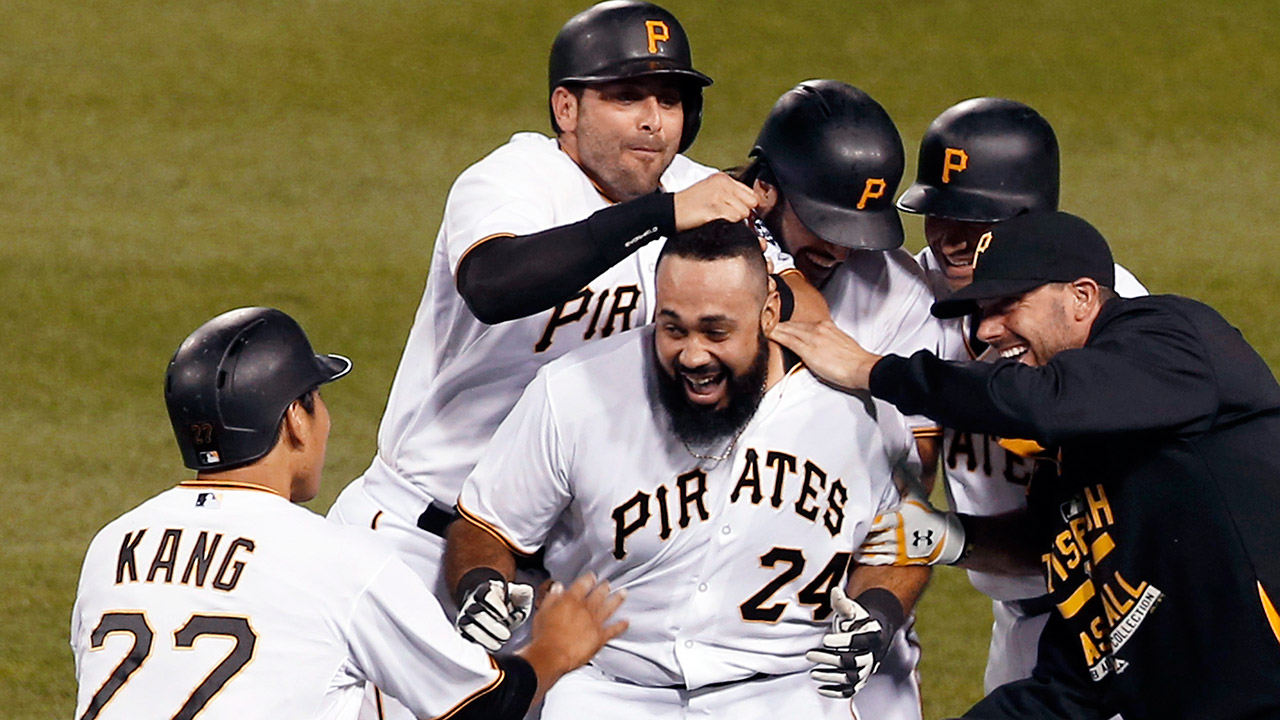 Francisco Cervelli of the Pittsburgh Pirates scores ahead of the