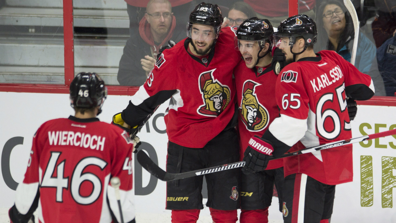 Ottawa-Senators-centre-Shane-Prince-(10)-celebrates-his-goal-against-the-Tampa-Bay-Lightning-with-teammates-Mika-Zibanejad-(93)-Erik-Karlsson-(65)-and-Patrick-Wiercioch-(46)-during-first-period-NHL-hockey-action-in-Ottawa-on-Monday,-February-8,-2016.-THE-CANADIAN-PRESS/Adrian-Wyld