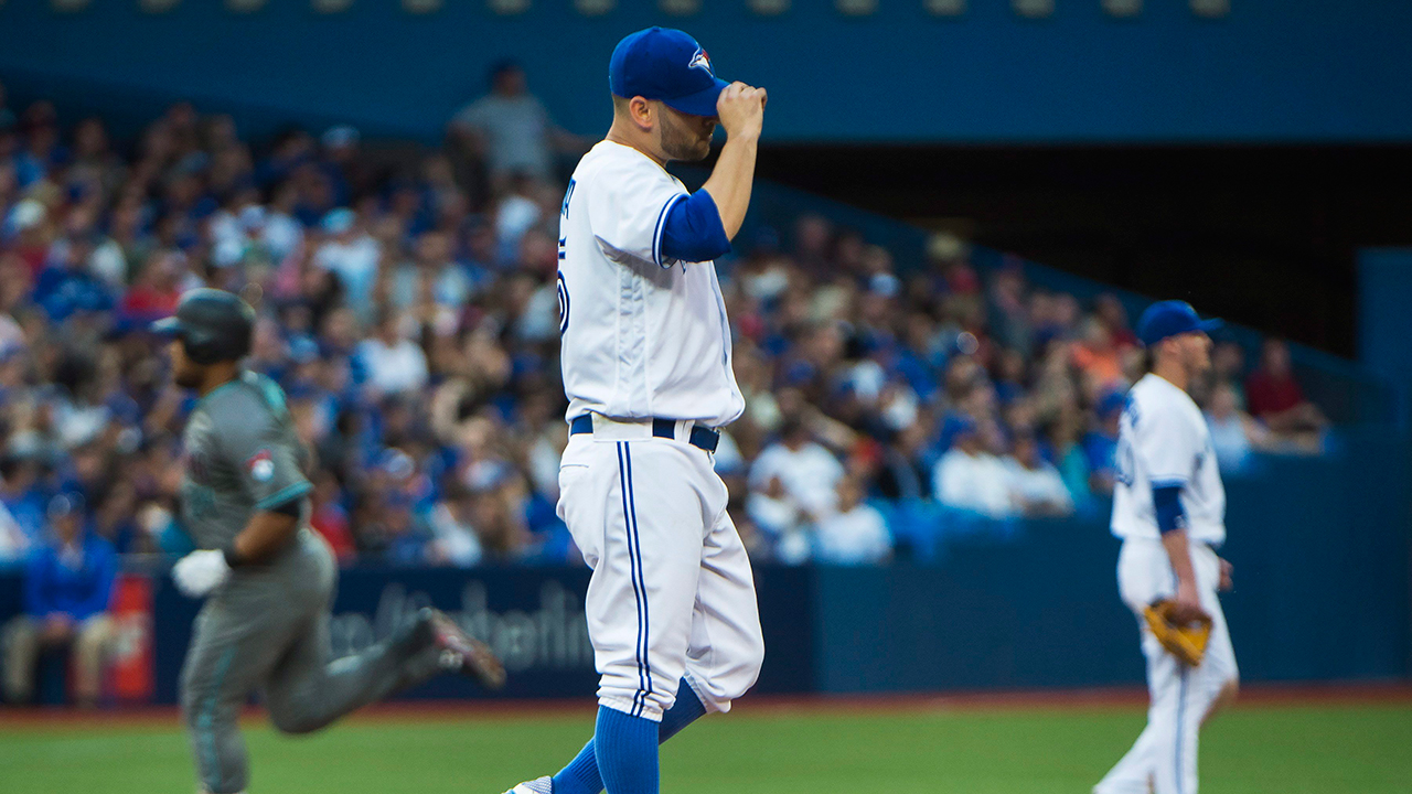 Toronto Blue Jays starting pitcher Marco Estrada (25) walks back to the  dugout after being taken out of the game during the fifth inning of a  baseball game, Tuesday, Aug. 15, 2017