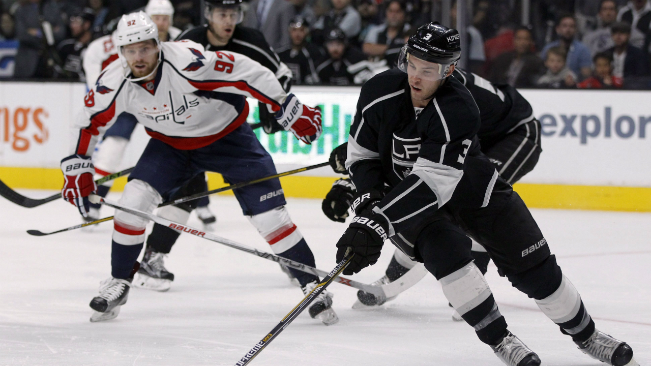 Los-Angeles-Kings-defenseman-Brayden-McNabb-(3)-controls-the-puck-in-front-of-Washington-Capitals-center-Evgeny-Kuznetsov-(92),-of-Russia,-during-the-first-period-of-an-NHL-hockey-game-in-Los-Angeles,-Wednesday,-March-9,-2016.-(AP-Photo/Alex-Gallardo)