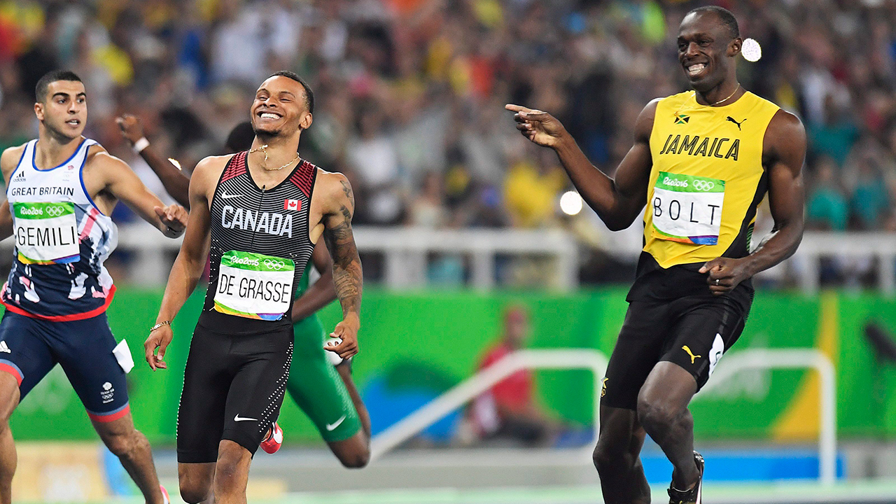 De Grasse within 0.02 seconds of Bolt in 200m semi to reach final