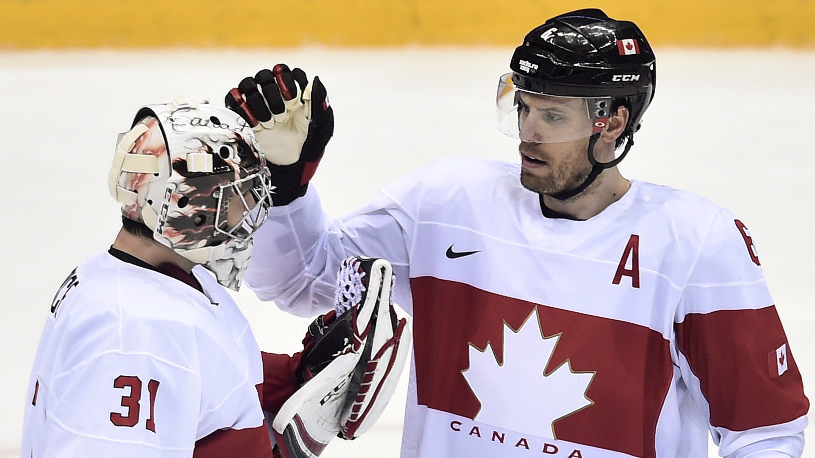 Ben and Belle show off their new Braden Holtby Canucks jerseys