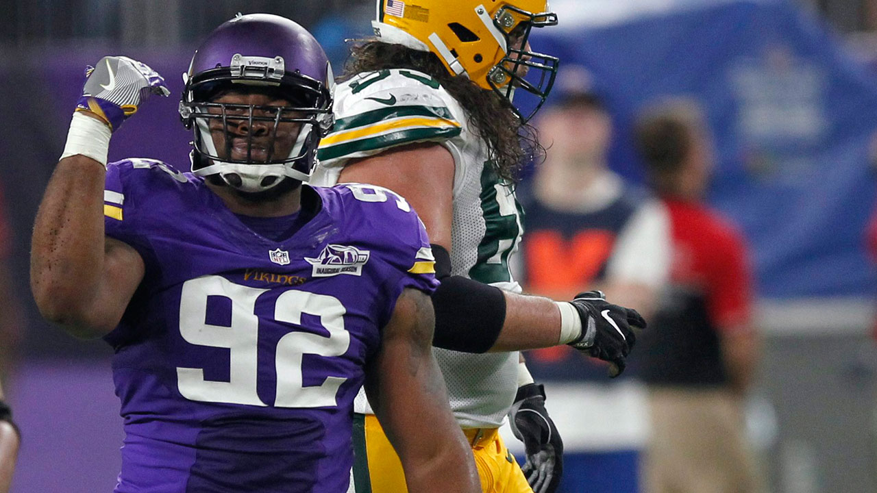 Minnesota Vikings defensive tackle Tom Johnson and Minnesota