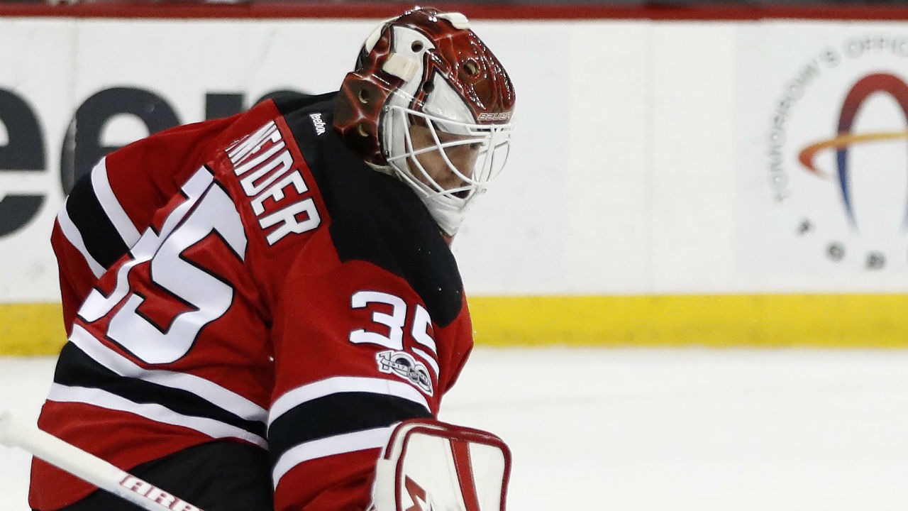 Devils goalie Cory Schneider leaves game with appa