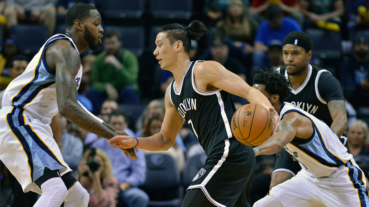 NBA Brooklyn Nets guard Jeremy Lin, left, and his younger brother