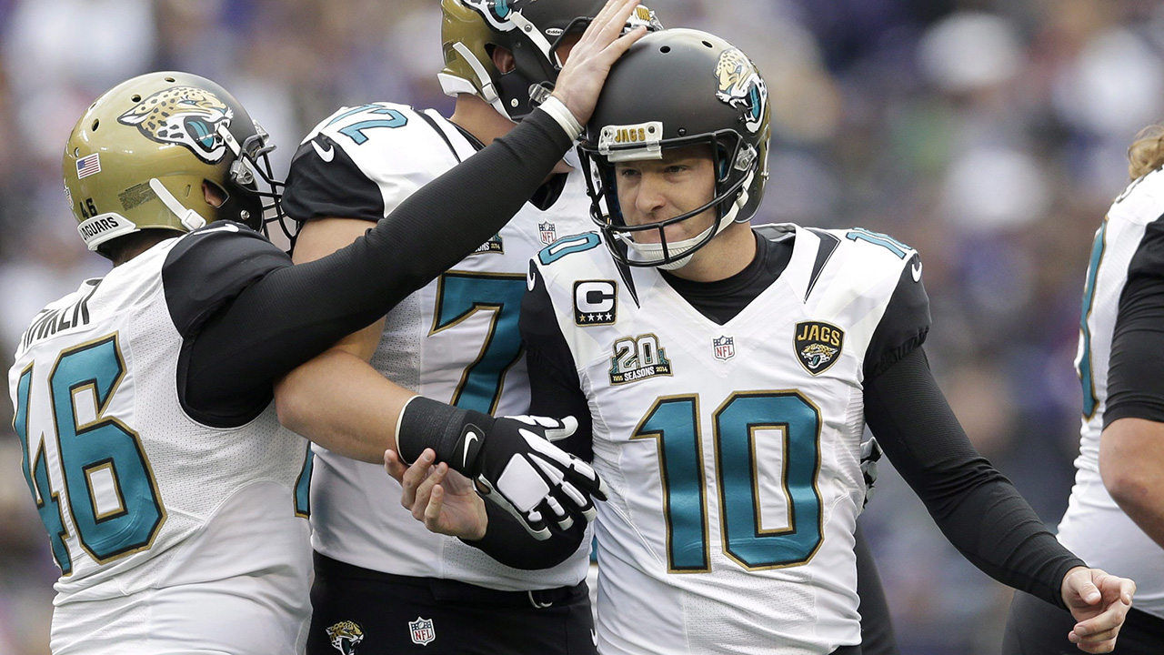 Jacksonville Jaguars kicker Josh Scobee (10) is congratulated by