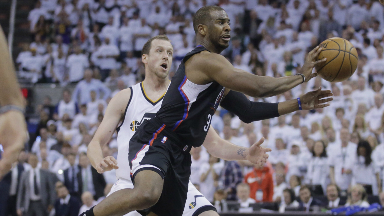 Los-Angeles-Clippers-guard-Chris-Paul,-right,-passes-the-ball-as-Utah-Jazz-forward-Joe-Ingles-watches-during-the-first-half-in-Game-3-of-an-NBA-basketball-first-round-playoff-series-Friday,-April-21,-2017,-in-Salt-Lake-City.-(Rick-Bowmer/AP)