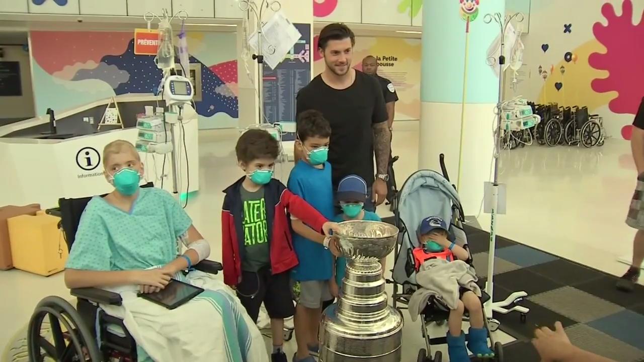 Penguins' Letang brings Stanley Cup to visit kids in Montreal