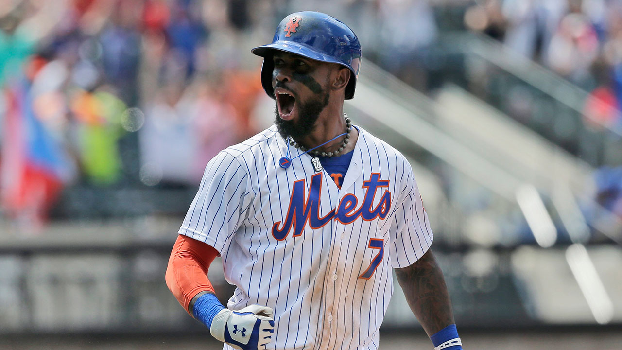 New York Mets shortstop Jose Reyes (7) watches from the bench