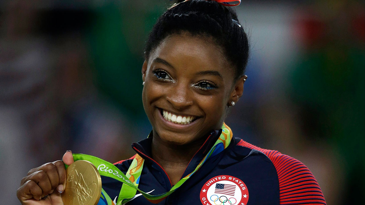 Simone Biles lands Yurchenko double pike during Olympic training