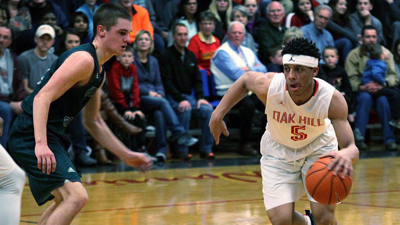 Nova-Scotia-native-Lindell-Wigginton-(5)-drives-towards-the-net-during-a-game-at-the-Oak-Hill-Academy's-Turner-Gymnasium-on-Jan.-29,-2017.-Wigginton-headlines-the-Canadian-roster-for-next-month's-FIBA-U19-Basketball-World-Cup-in-Cairo.(Nathan-Graybeal/CP)