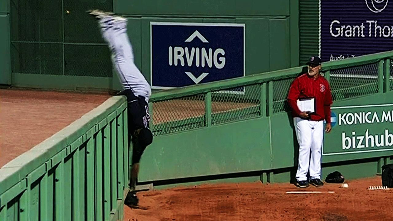 Austin Jackson jumps over wall and into Fenway bullpen to rob home run