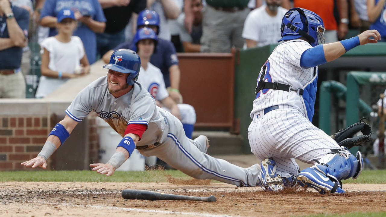 Chicago Cubs' Darwin Barney, right, throws to first after forcing