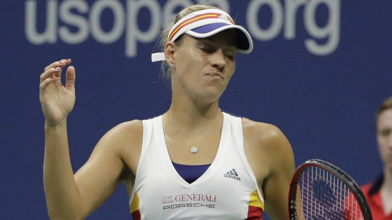 Angelique-Kerber,-of-Germany,-reacts-after-losing-a-point-to-Misaki-Doi,-of-Japan,-during-the-first-round-of-the-U.S.-Open-tennis-tournament,-Tuesday,-Aug.-29,-2017,-in-New-York.-(Frank-Franklin-II/AP)