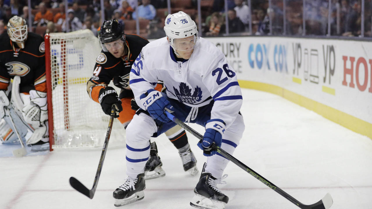 Toronto-Maple-Leafs'-Nikita-Soshnikov,-centre,-of-Russia,-moves-the-puck-under-defense-by-Anaheim-Ducks'-Cam-Fowler-during-the-first-period-of-an-NHL-hockey-game-Friday,-March-3,-2017,-in-Anaheim,-Calif.-(Jae-C.-Hong/AP)