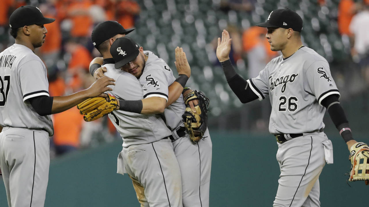 Jose Abreu and Yoan Moncada of the Chicago White Sox celebrate a win