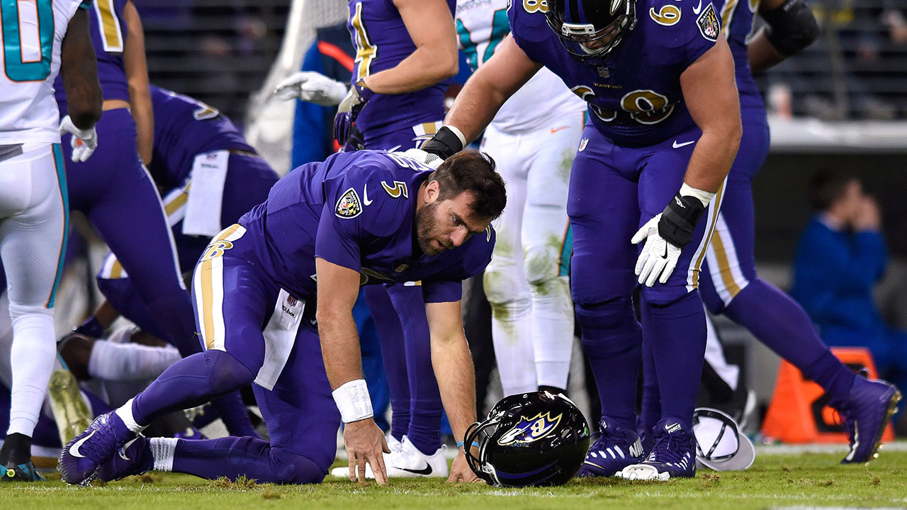 Ravens quarterback Joe Flacco hurt on tackle by Dolphins