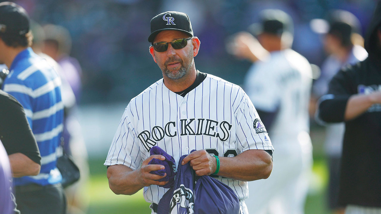 Brian Snitker, third base coach Ron Washington, and Kevin Seitzer