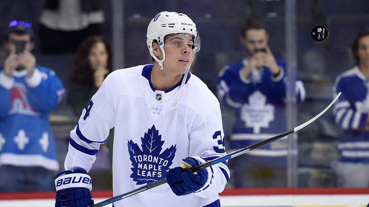 Auston Matthews reacts to putting on the (new) Leafs jersey for first time  - The Hockey News