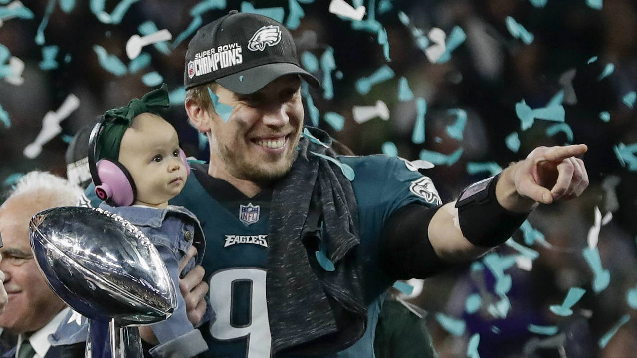 Philadelphia-Eagles'-Nick-Foles-holds-his-daughter,-Lily,-after-beating-the-New-England-Patriots-in-the-NFL-Super-Bowl-52-football-game-Sunday,-Feb.-4,-2018,-in-Minneapolis.-(Frank-Franklin-II/AP)