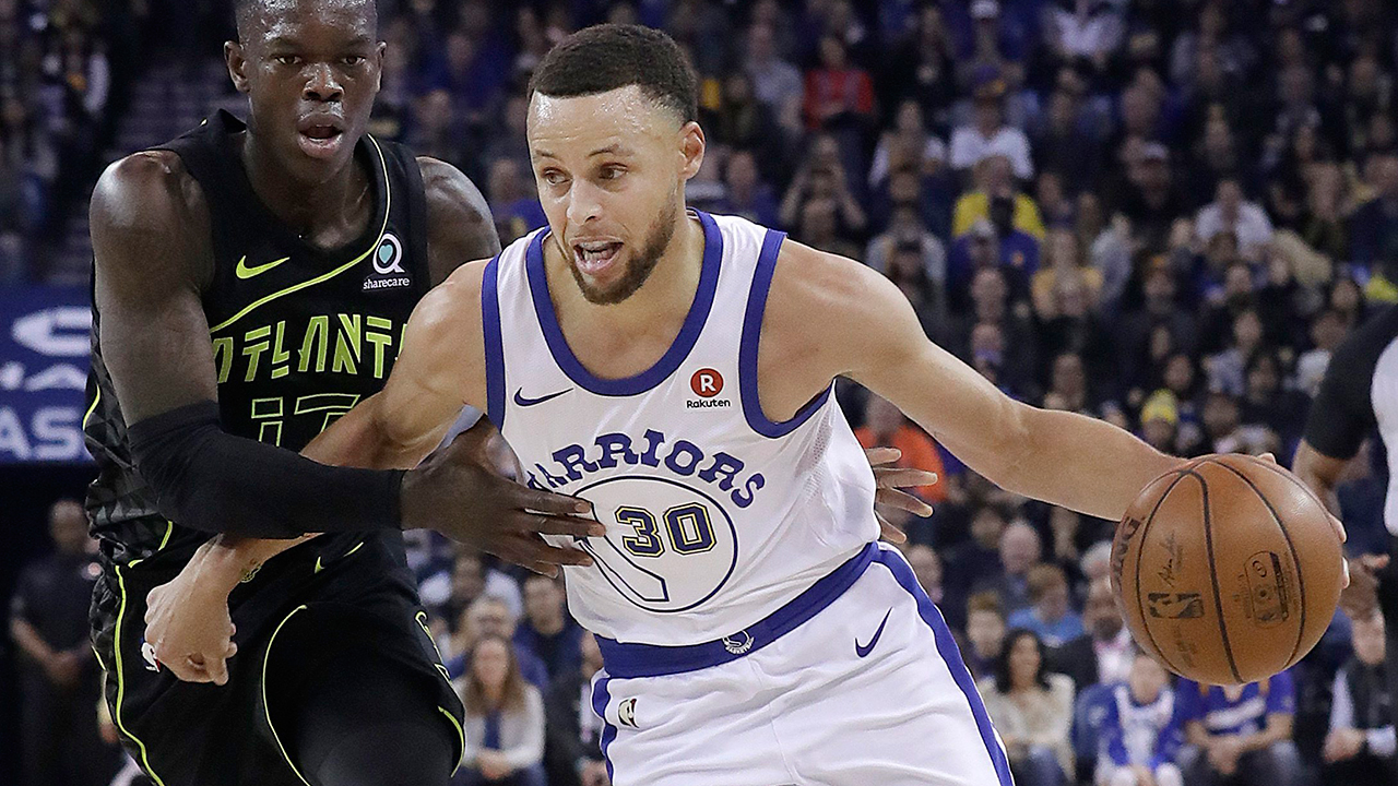 Warriors' Steph Curry shows out at Oakland Athletics game