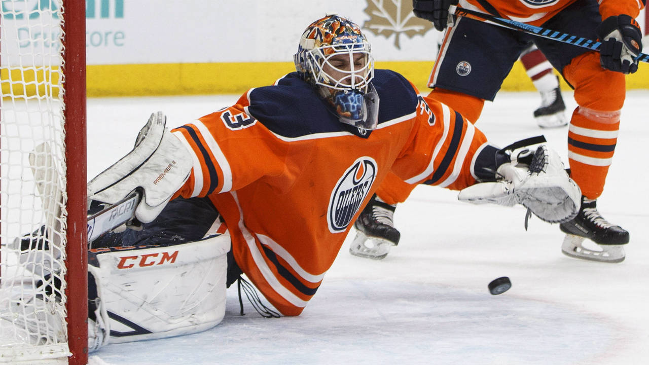 Edmonton Oilers goalie Cam Talbot (33) makes the save against the Arizona Coyotes during first period NHL action in Edmonton, Alta., on Monday March 5, 2018. (Jason Franson/CP)