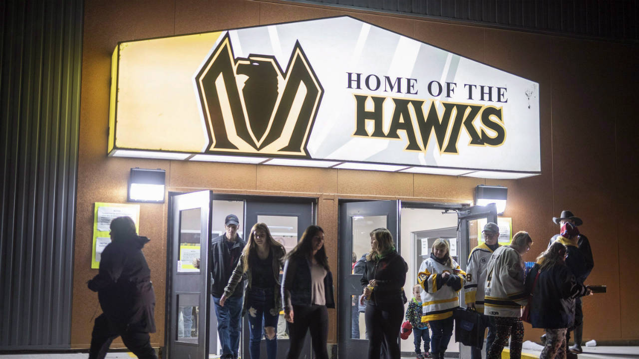 People-leave-game-one-of-the-Saskatchewan-Junior-Hockey-league-finals-between-the-Estevan-Bruins-and-Nipawin-Hawks-in-Nipawin,-Sask.-on-Saturday,-April-14,-2018.-(Liam-Richards/CP)