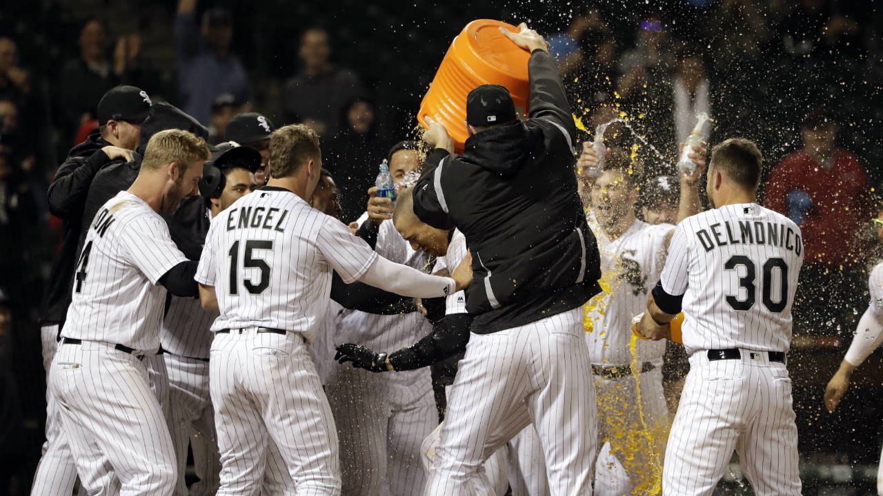 The Chicago White Sox baseball team congratulates each other with