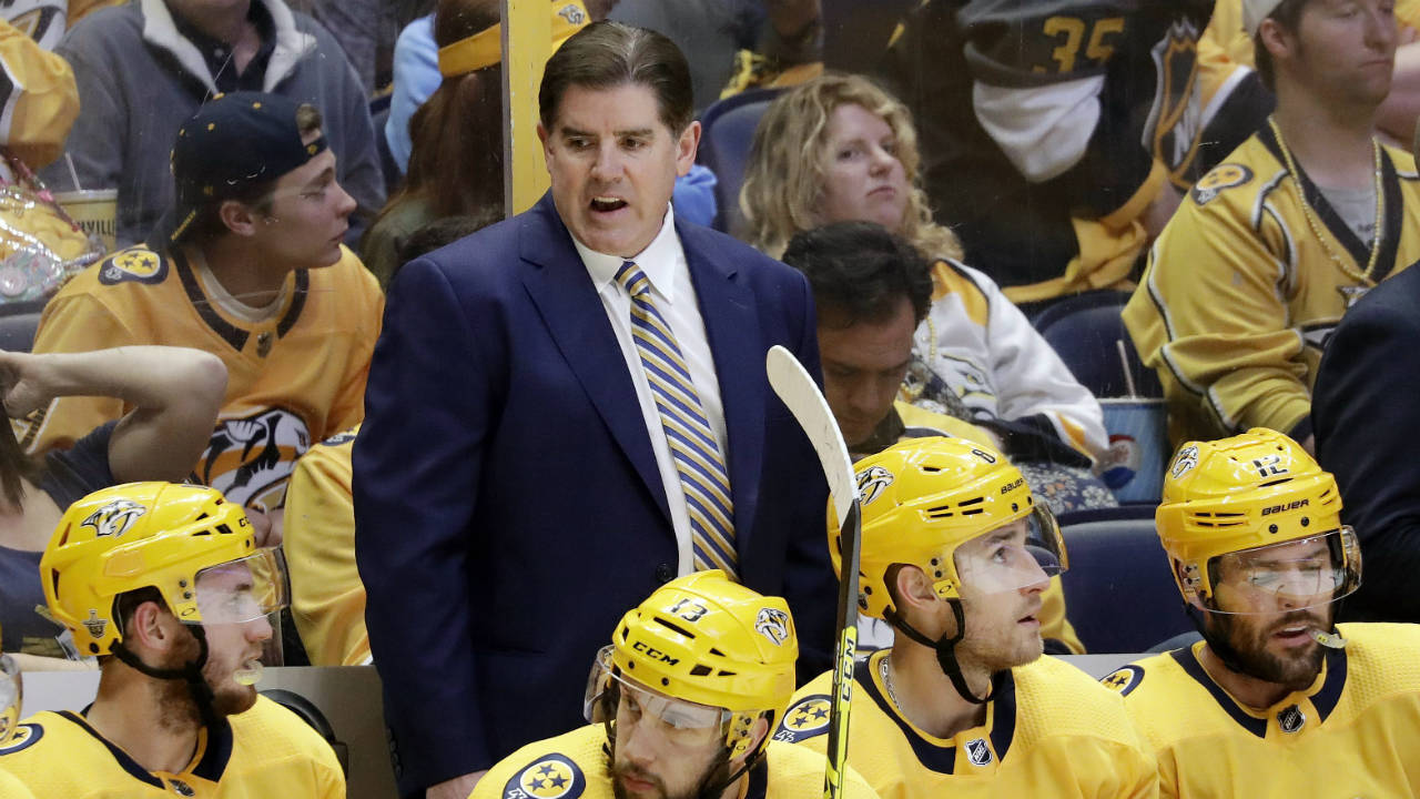 Nashville-Predators-head-coach-Peter-Laviolette,-top-centre,-talks-to-his-players-during-the-first-period-in-Game-1-of-an-NHL-hockey-second-round-playoff-series-against-the-Winnipeg-Jets,-Friday,-April-27,-2018,-in-Nashville,-Tenn.-(Mark-Humphrey/AP)