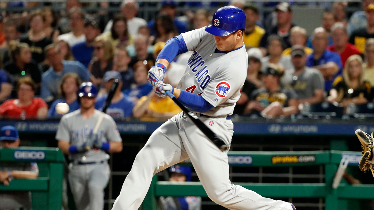 Chicago Cubs catcher WILSON CONTRERAS shakes the hand of starting pitcher  KYLE HENDRICKS