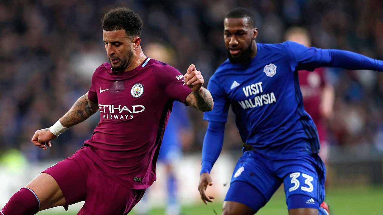 kyle-walker-vies-for-ball-with-junior-hoilett