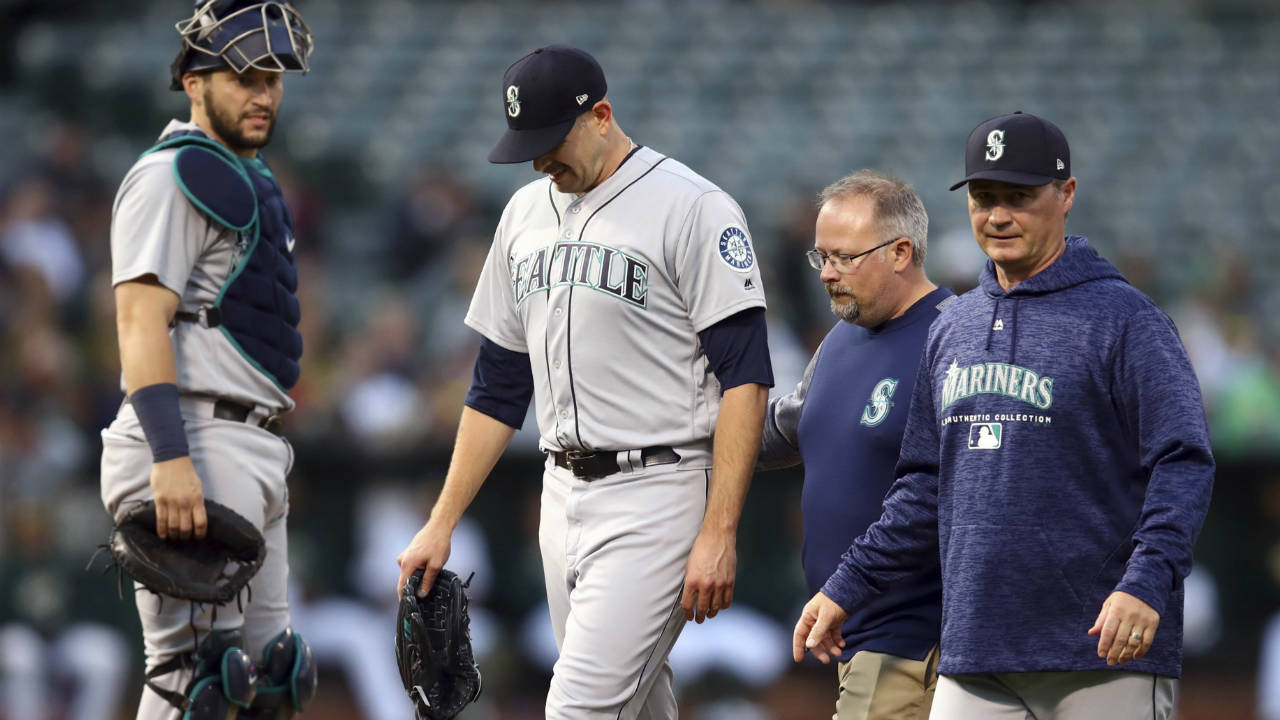 Mariners ace Felix Hernandez still hurting a day after getting hit on his  right forearm by a line drive