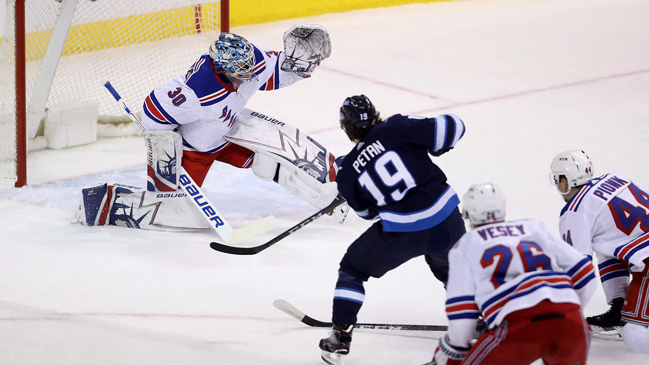 jets-nic-petan-shoots-on-rangers-henrik-lundqvist